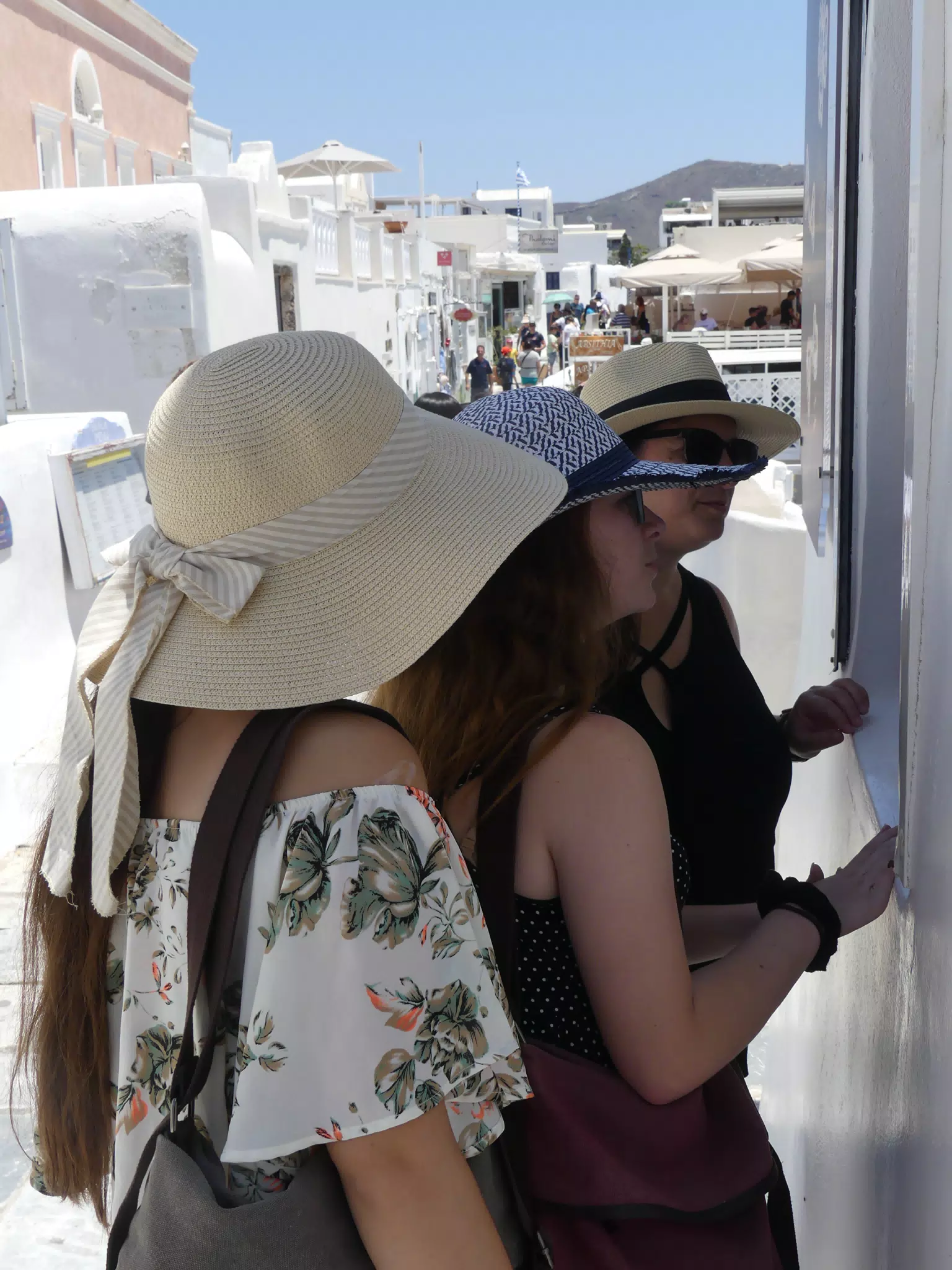 Girls Window Shopping in Oia, Santorini