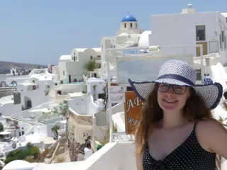 Madeline in Hat in Oia, Santorini