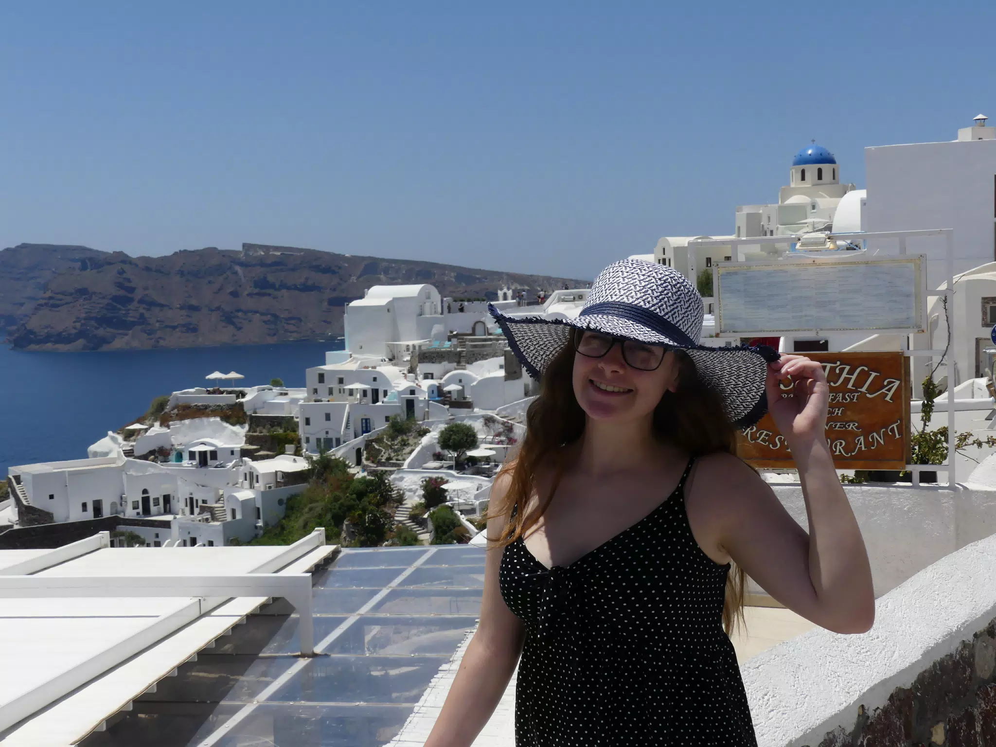 Madeline in Hat in Oia, Santorini