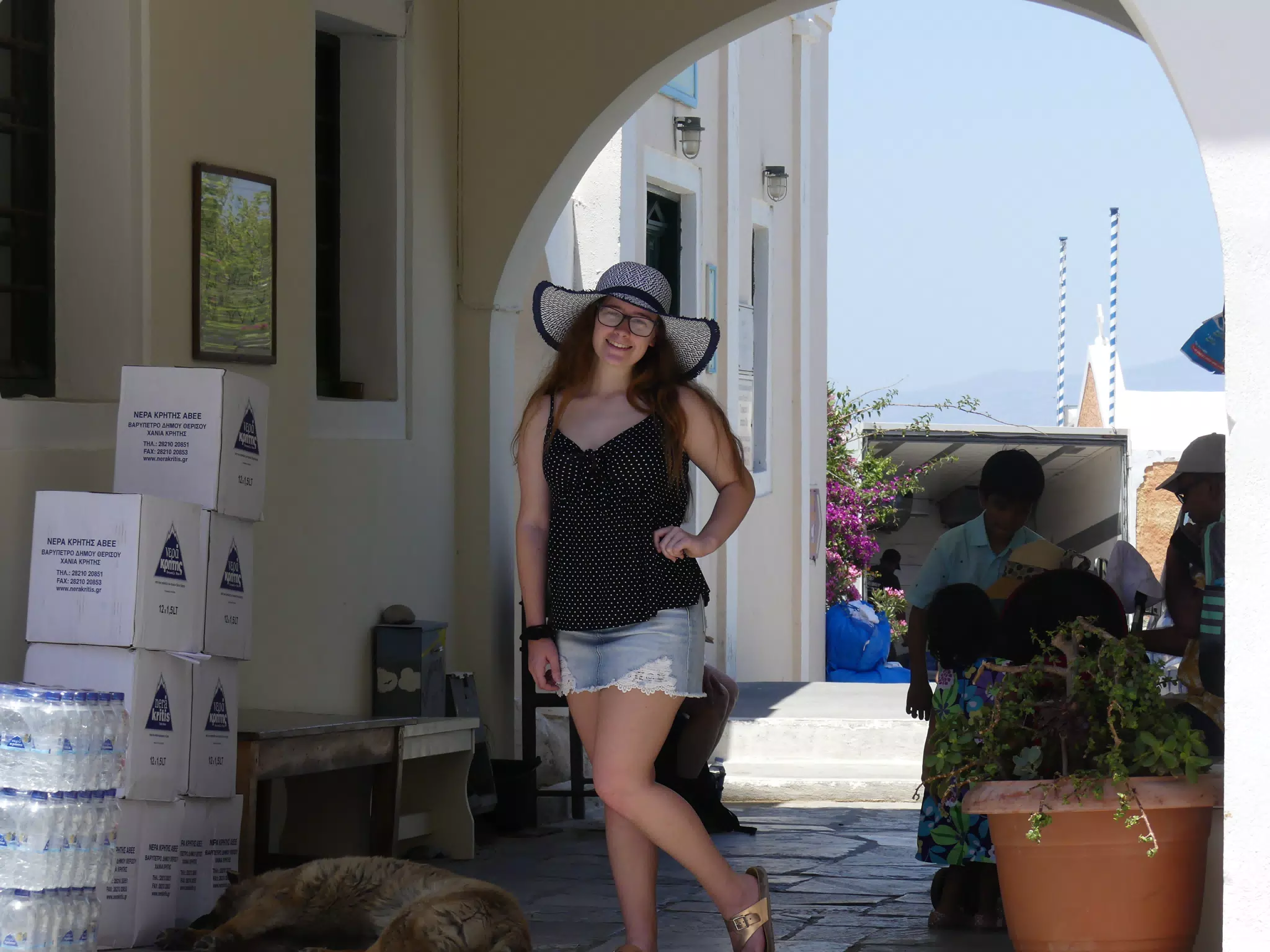 Madeline Posing in Hat and Miniskirt in Oia