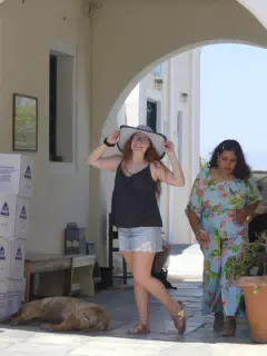 Madeline Posing with Hat in Oia, Santorini