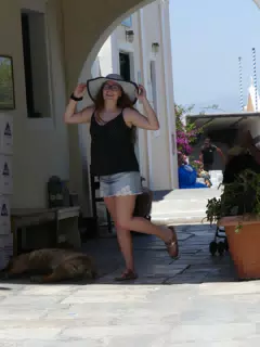 Madeline Modeling in Mini Skirt and Hat on Oia