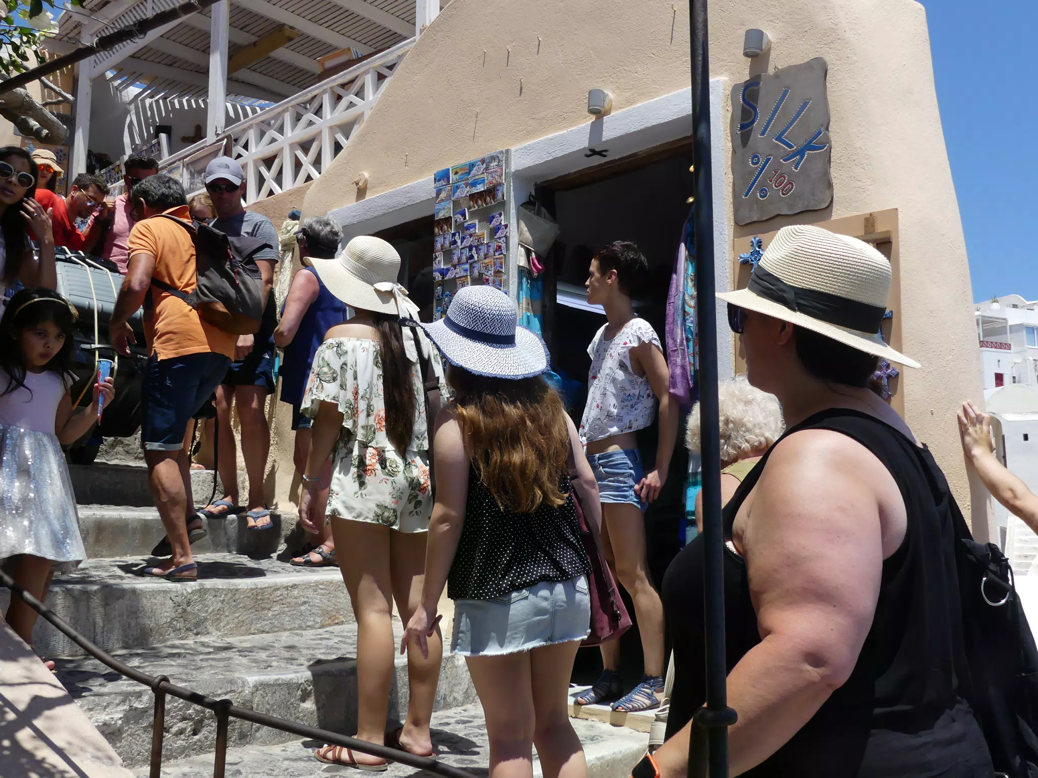 Girls Walking in Santorini