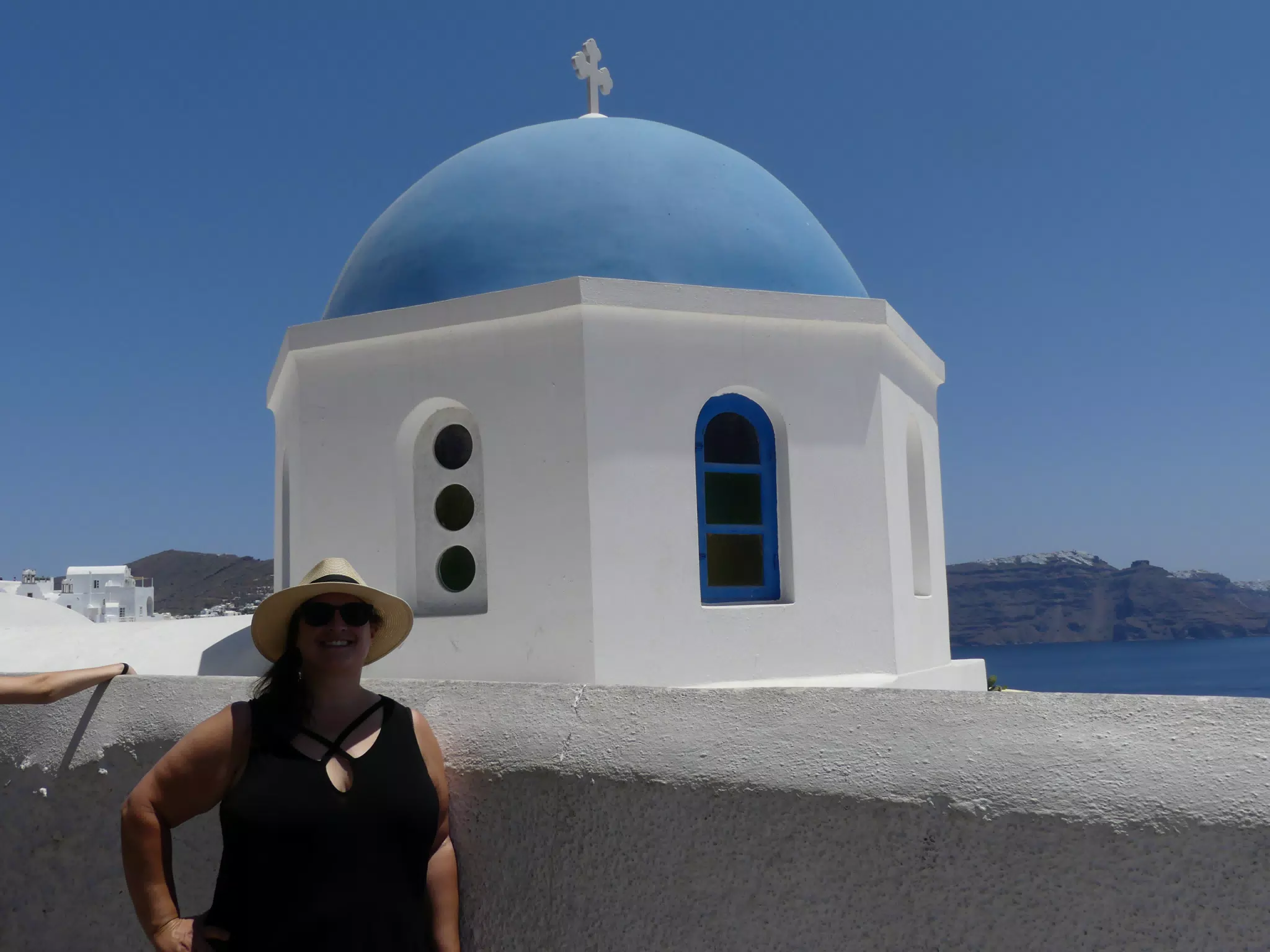 Dominica at the Blue Dome in Oia, Santorini