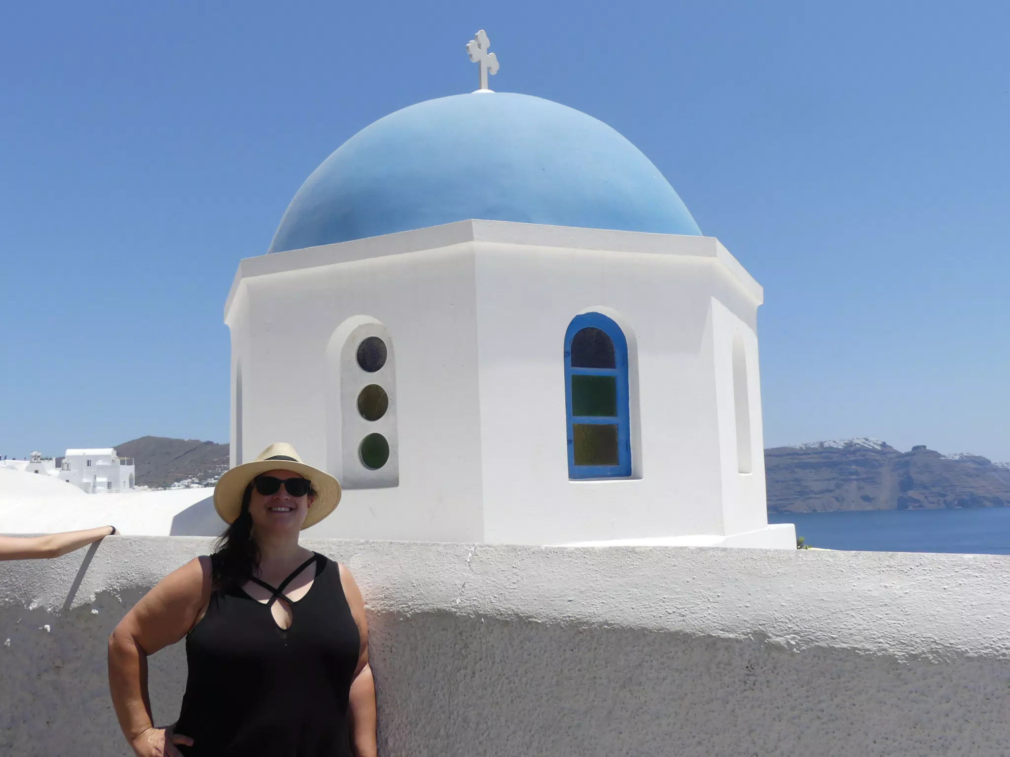 Dominica at the Blue Dome in Oia, Santorini