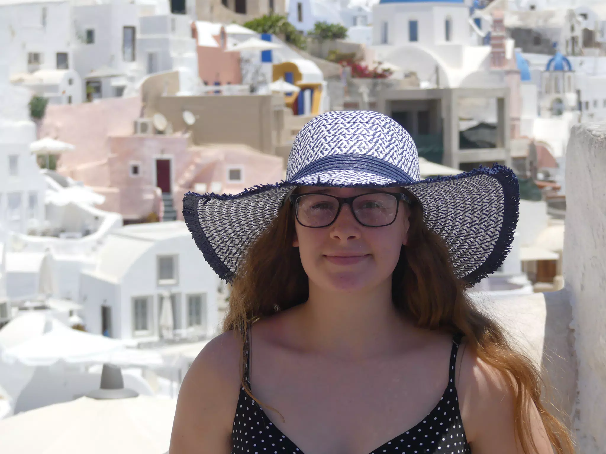 Madeline in Hat in Oia, Santorini
