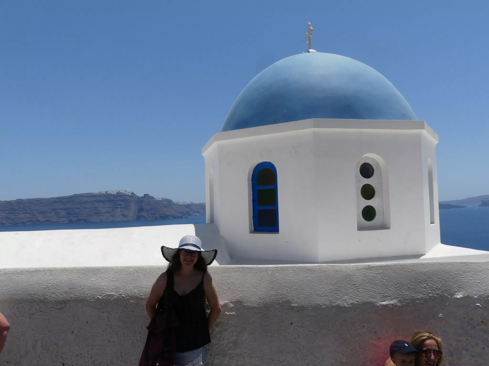 Madeline in Front of the Blue Dome, Oia, Santorini