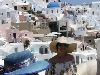 Emily in Hat in Oia, Santorini