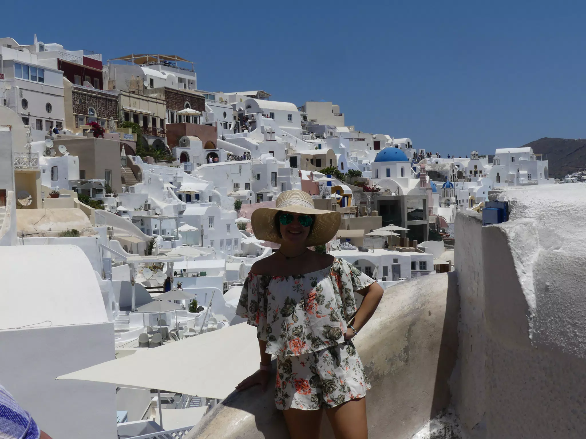 Emily in Hat in Oia, Santorini