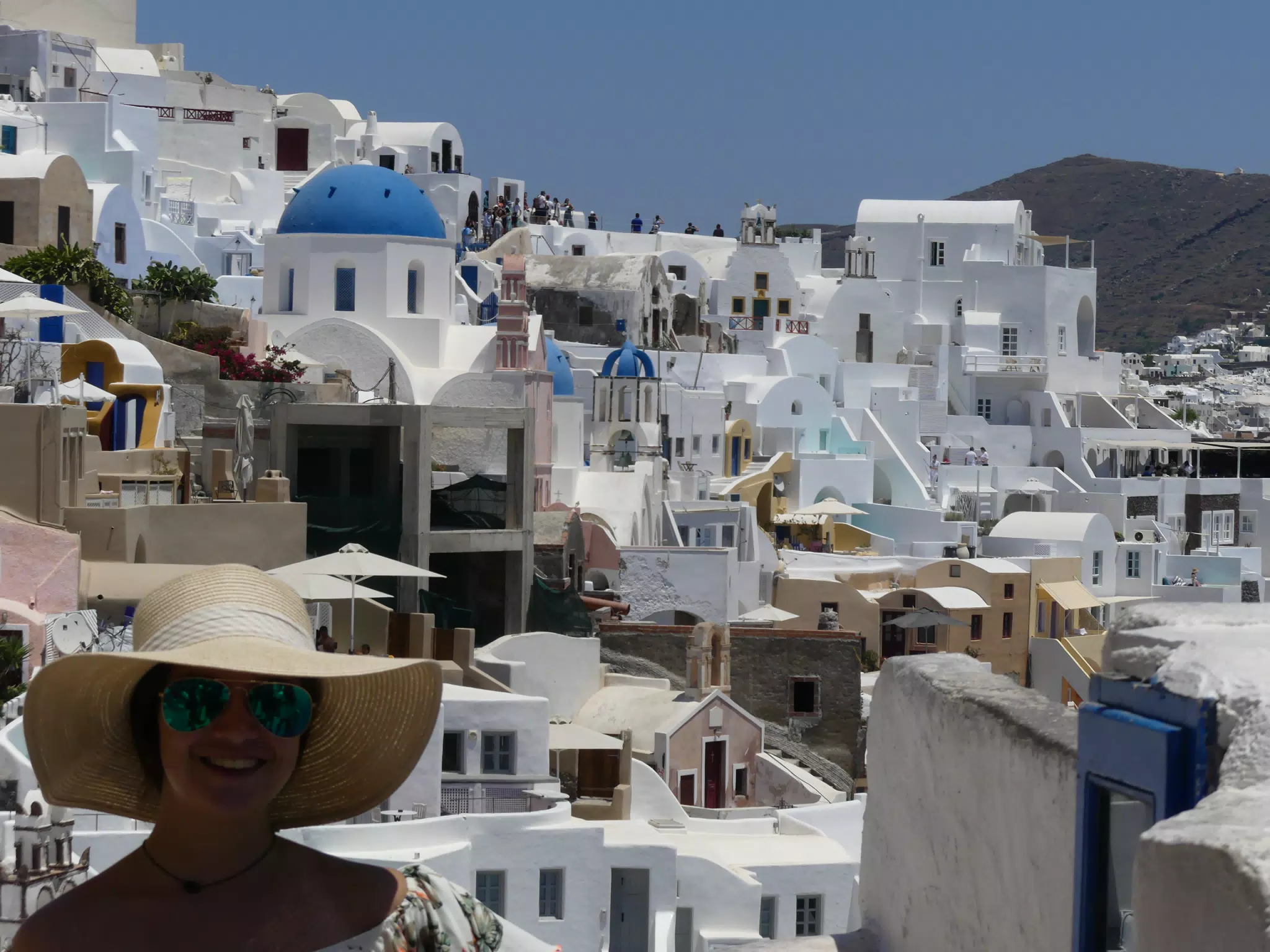 Emily in Hat in Oia, Santorini