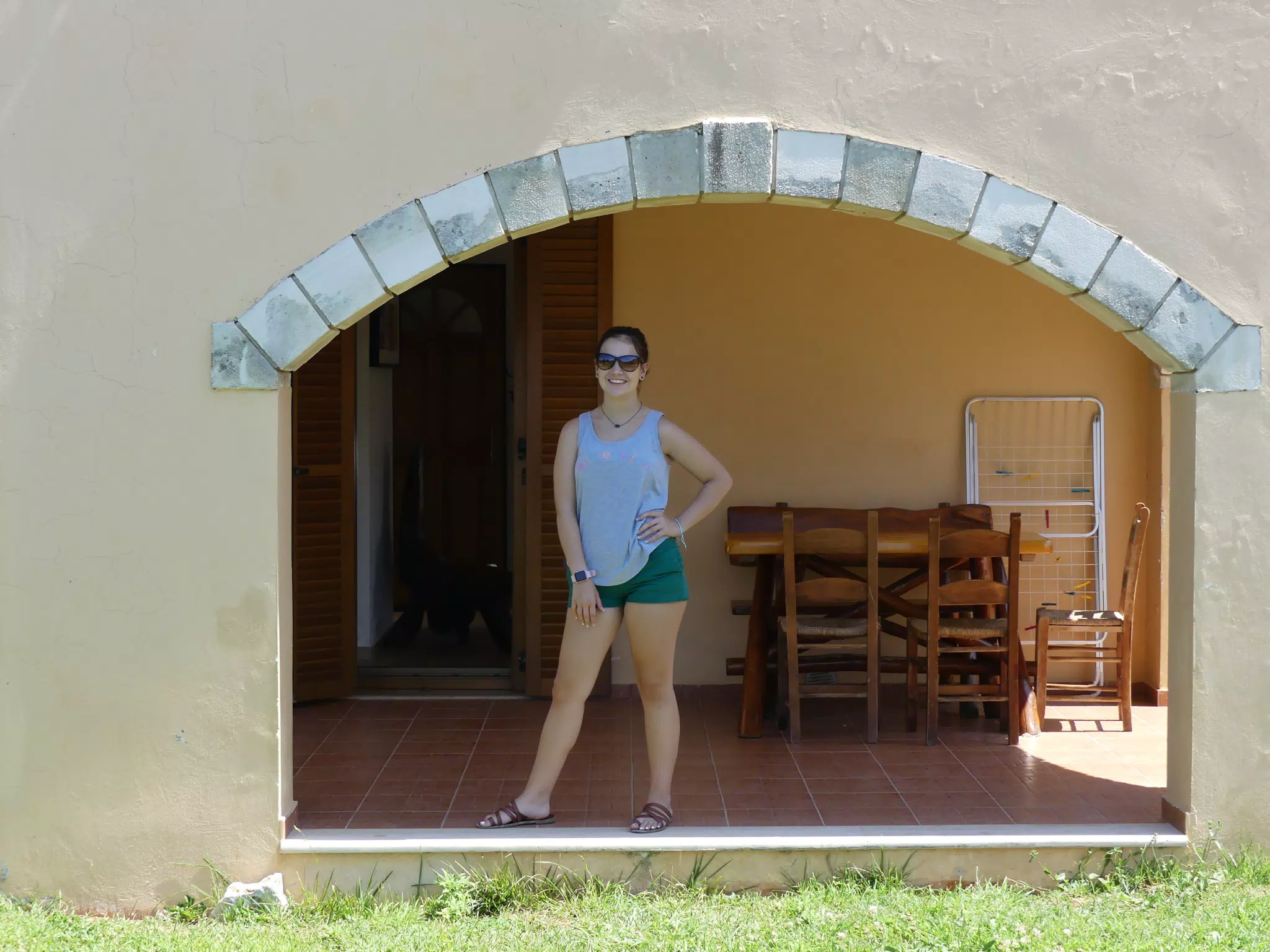 Emily at the Back Door of Our Cretan Apartment in Aptera