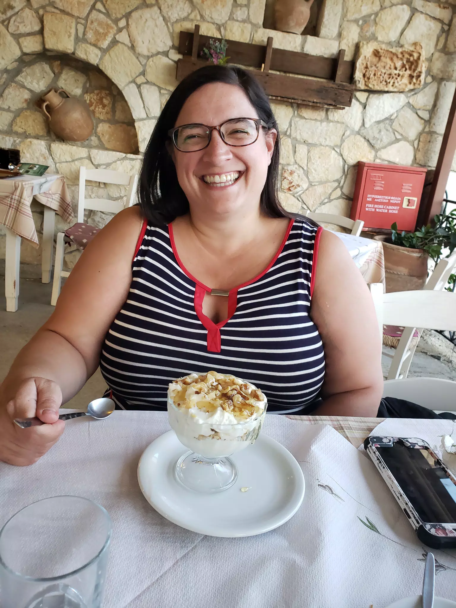Dominica Eating Dessert at the Cretan Corner