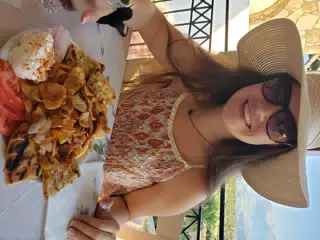 Emily Eating at the Cretan Corner in Aptera