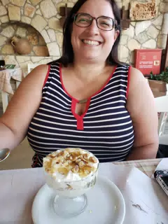Dominica Eating Dessert at the Cretan Corner