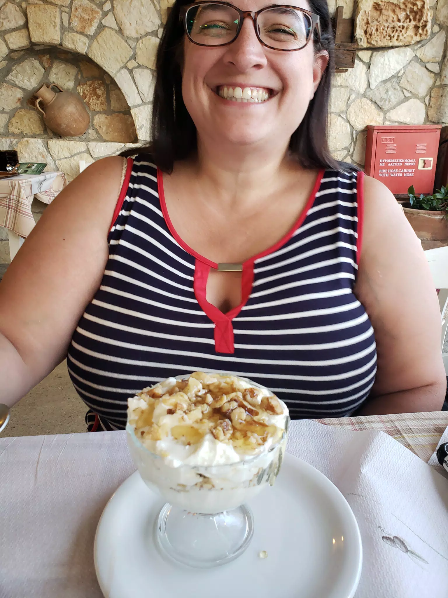 Dominica Eating Dessert at the Cretan Corner