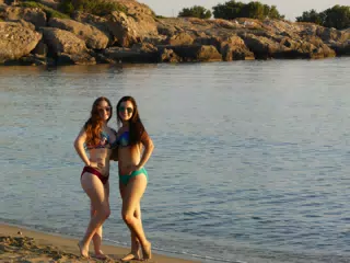 Madeline & Emily Posing in the Surf at Sunset on Palaiochora Beach on Crete, Greece