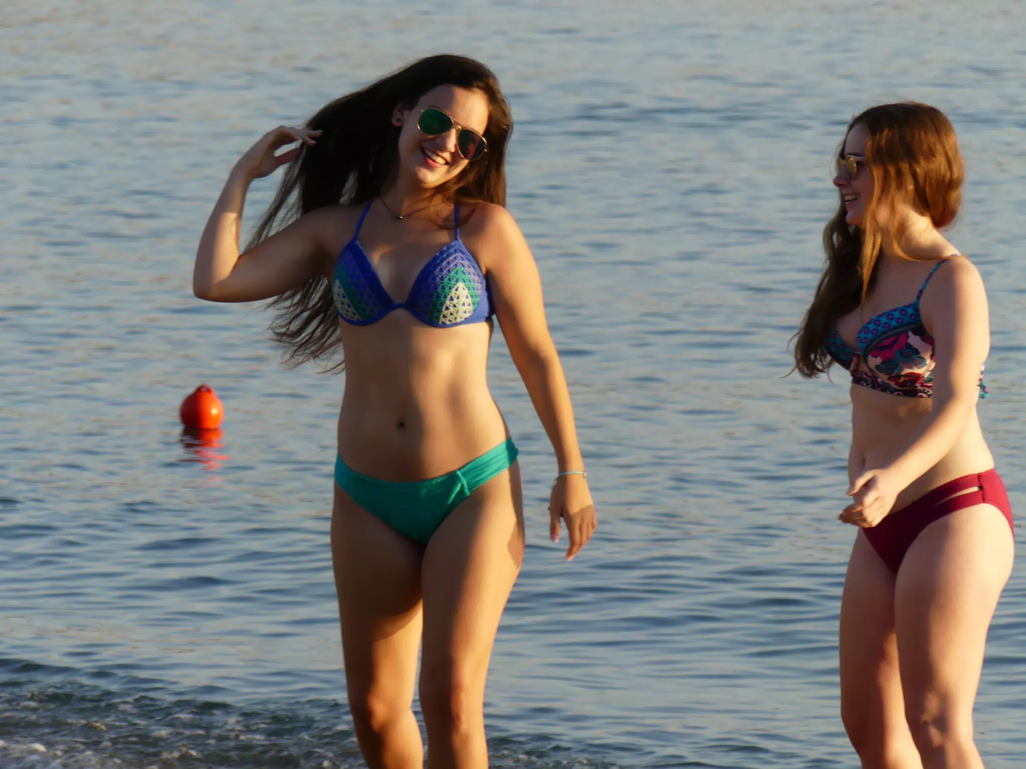 Emily & Madeline Talking on Greek Beach at Palaiochora