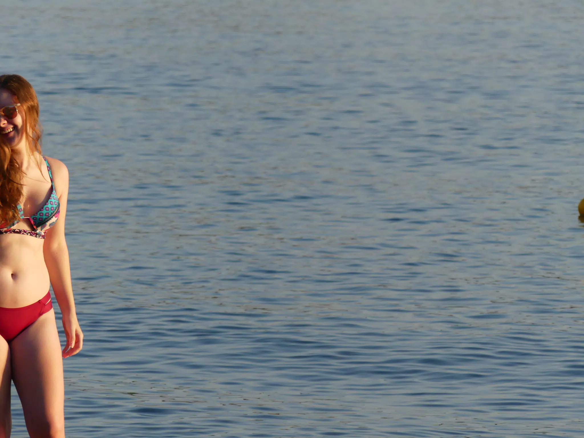 Madeline Laughing on the Beach