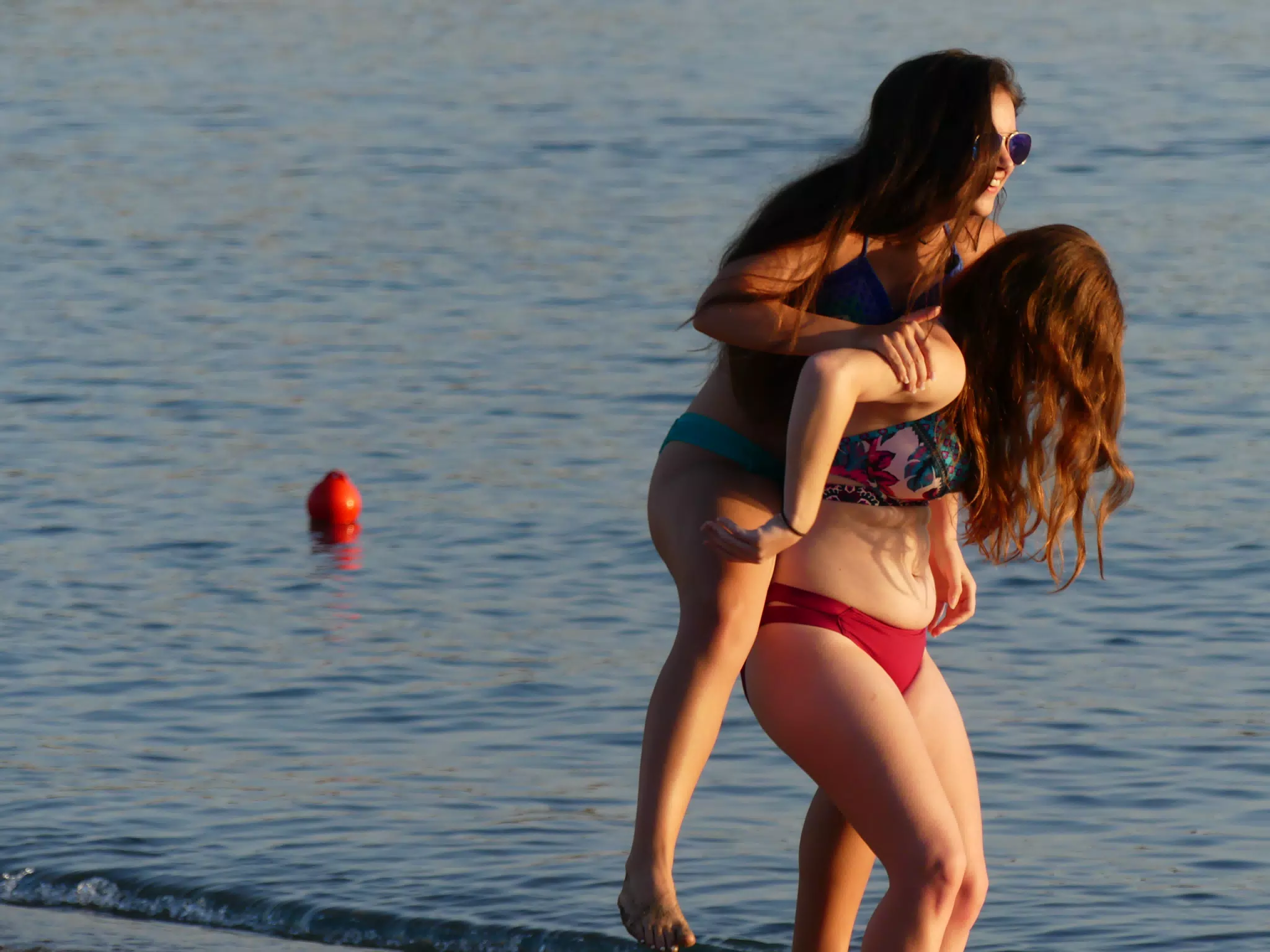 Emily Mounting Madeline on the Beach