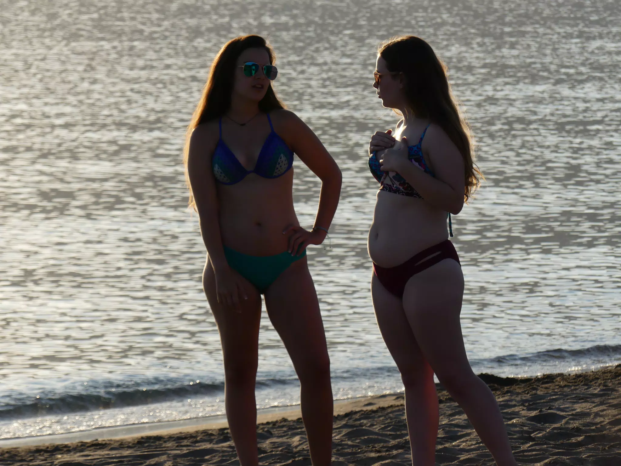 Sisters Talking on Beach