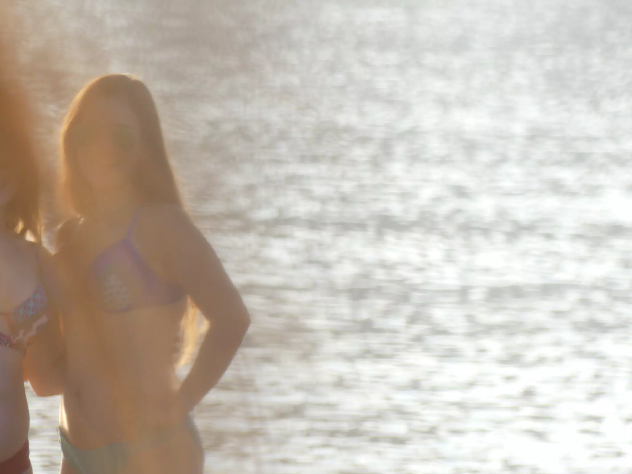 Emily on Beach through Leaves