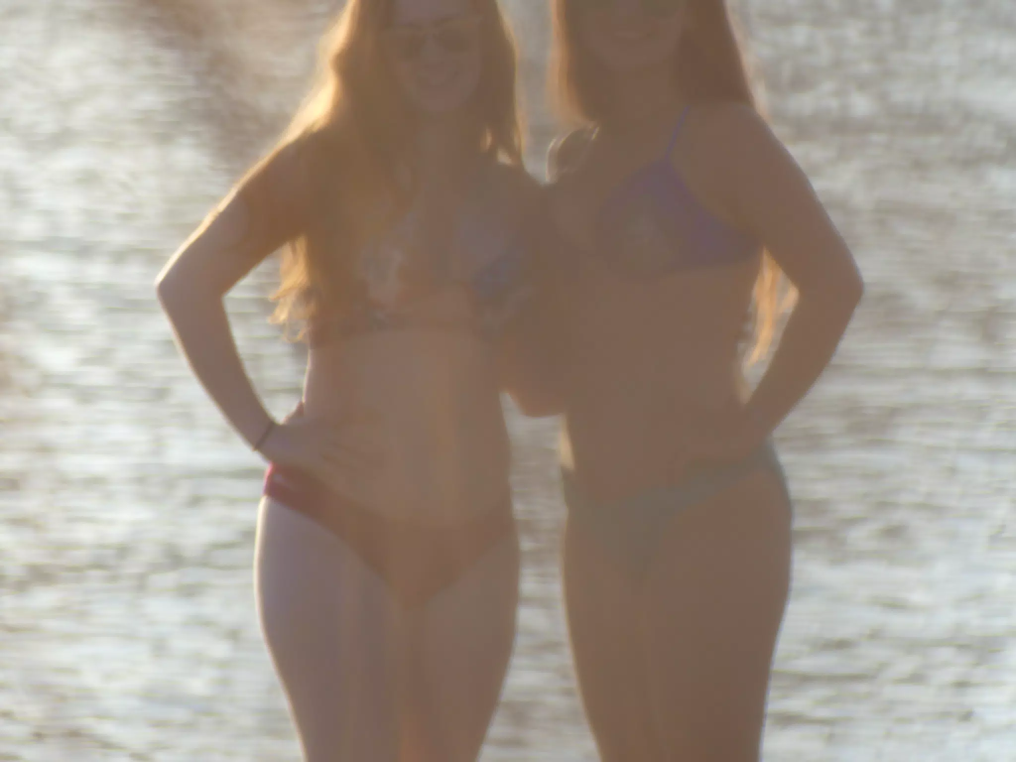 Girls on Beach Through Leaves