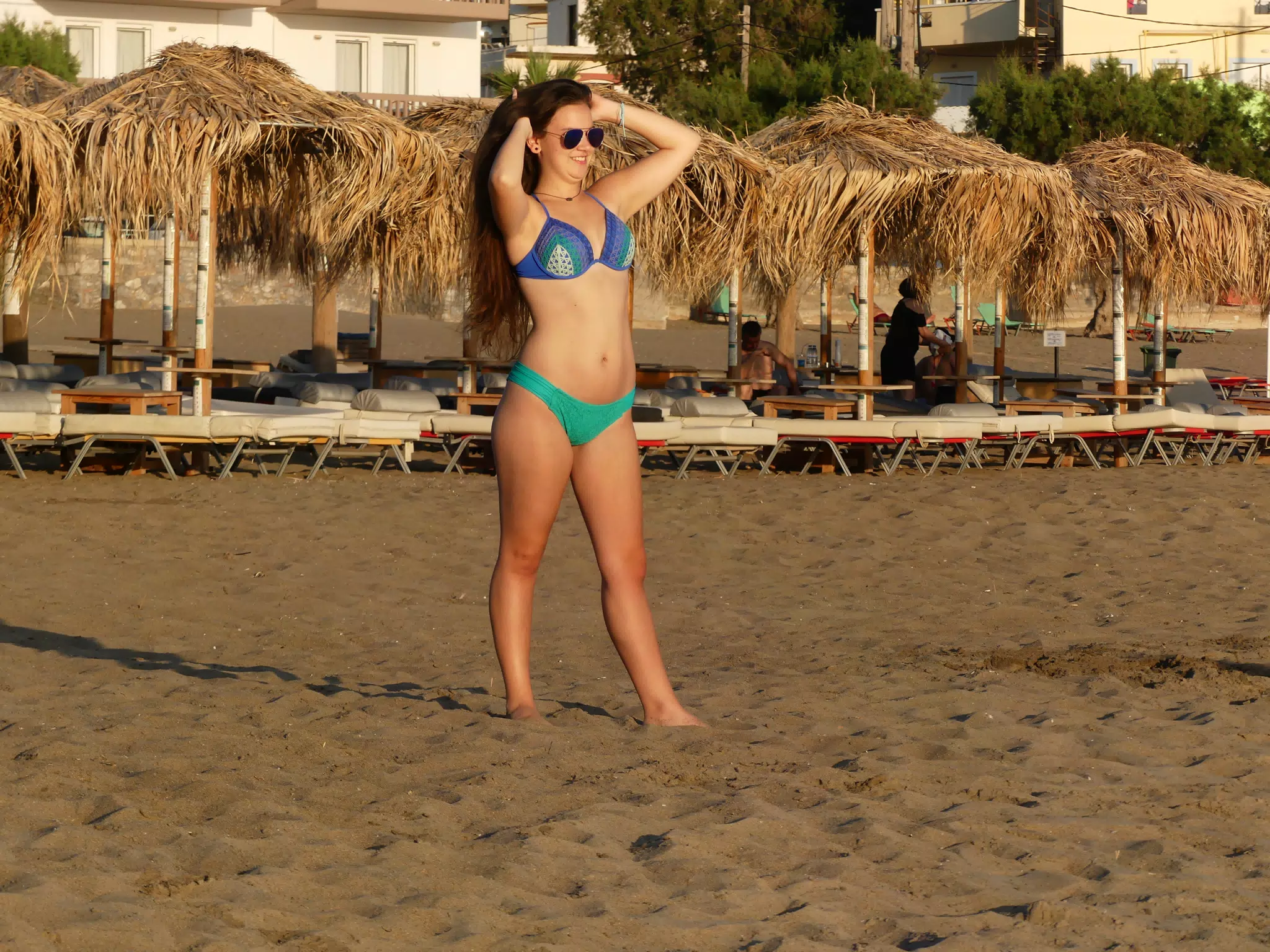Girl Fixing Hair on Palaiochora Beach