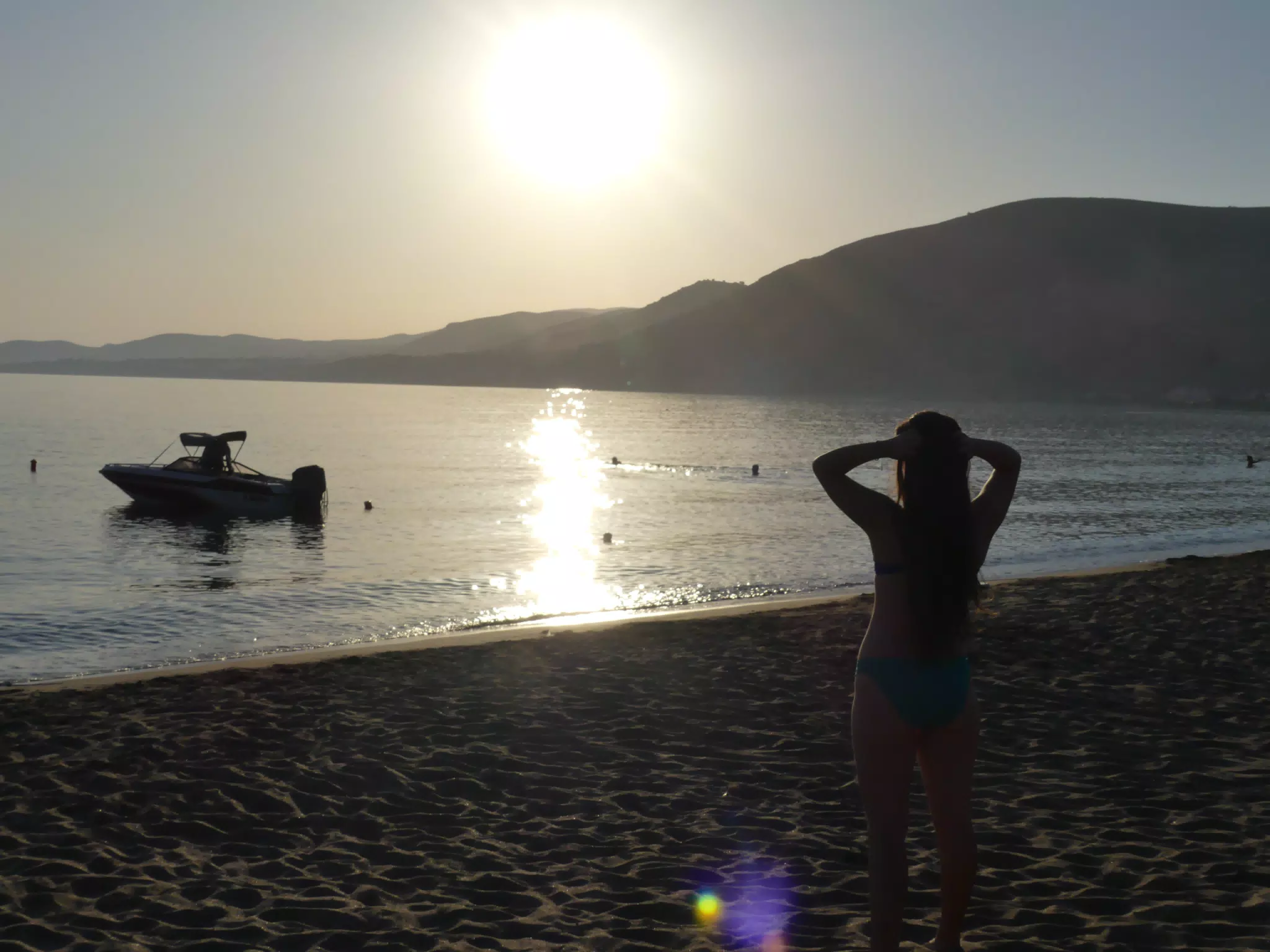 Emily Silouetted by Sunset on Beach on Crete