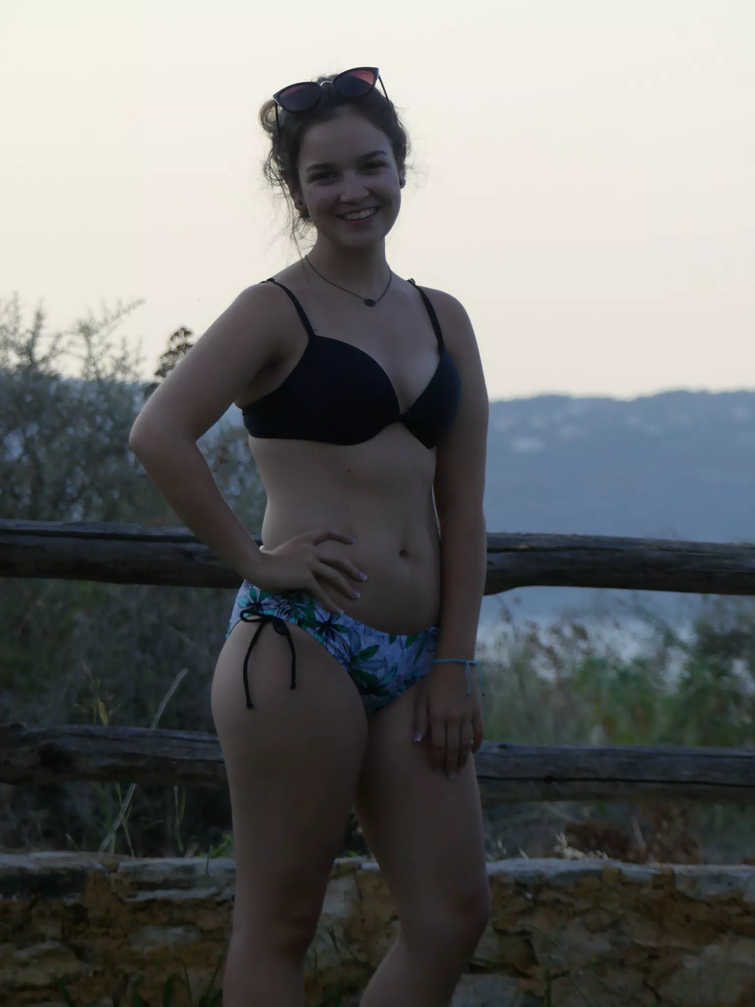 Posing by Fence at Dusk Above Souda Bay
