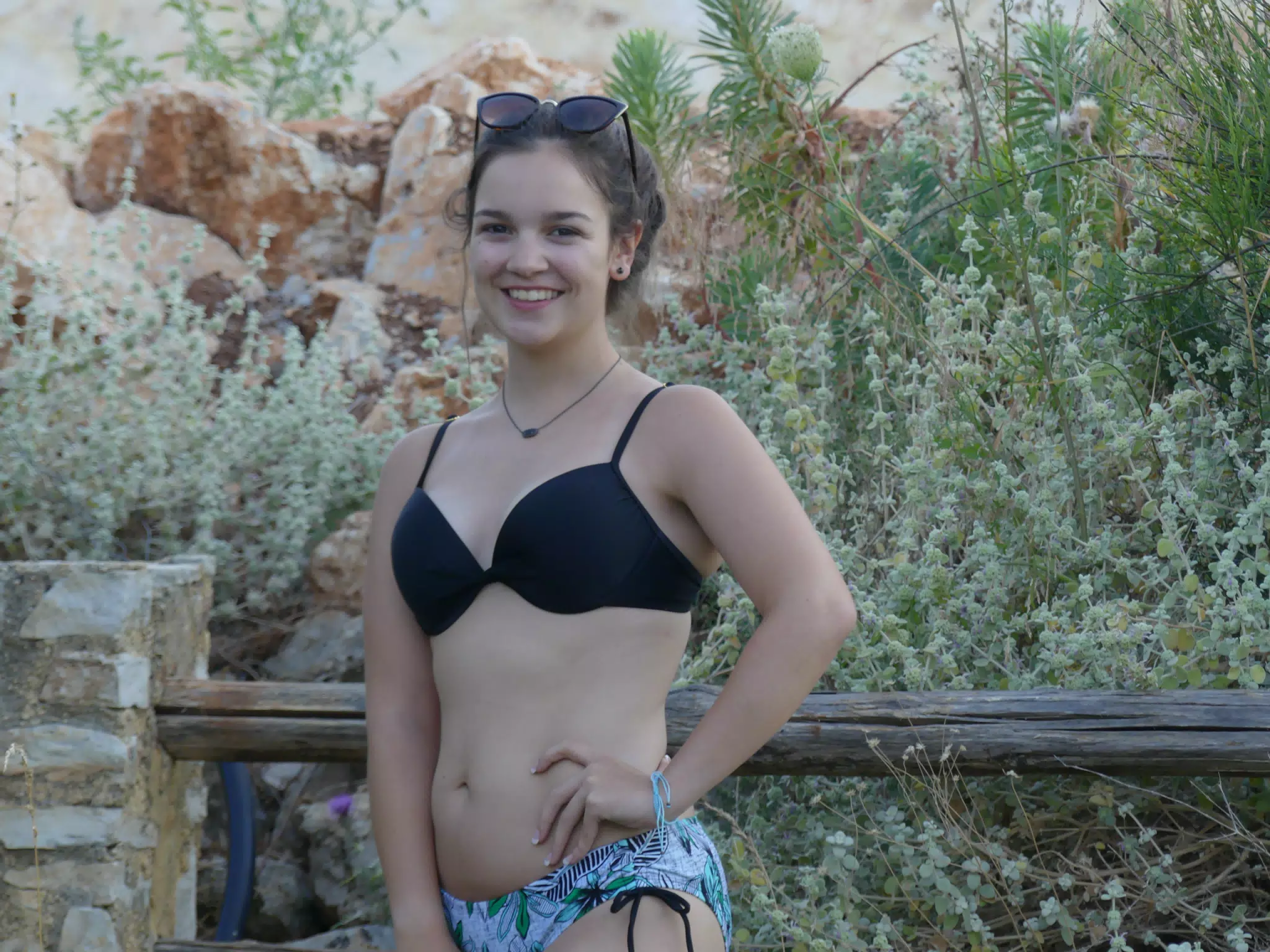 Emily Posing by Fence at Twilight in Aptera
