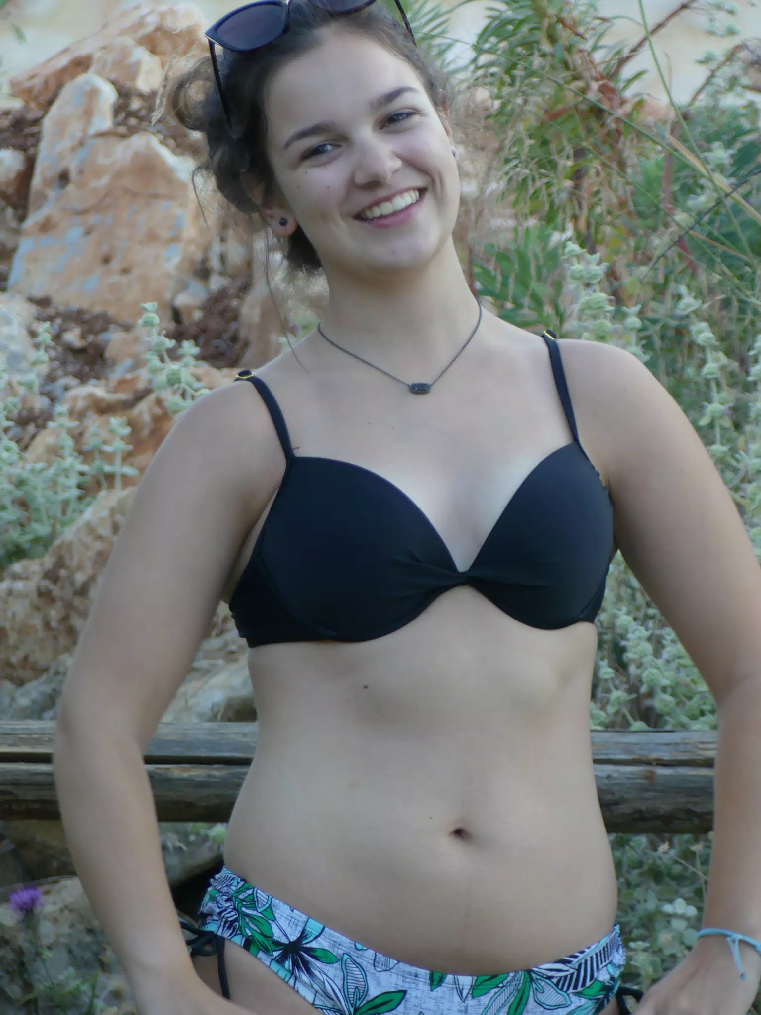 Emily Posing by Fence in Aptera