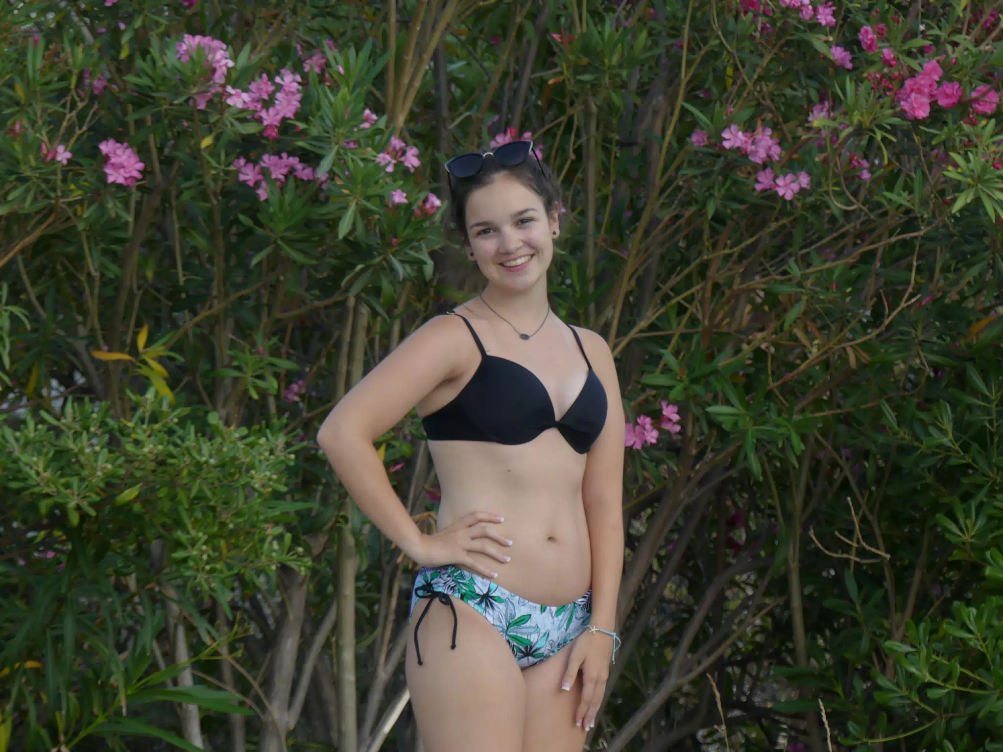 Emily in Swimsuit Posing by Flowers