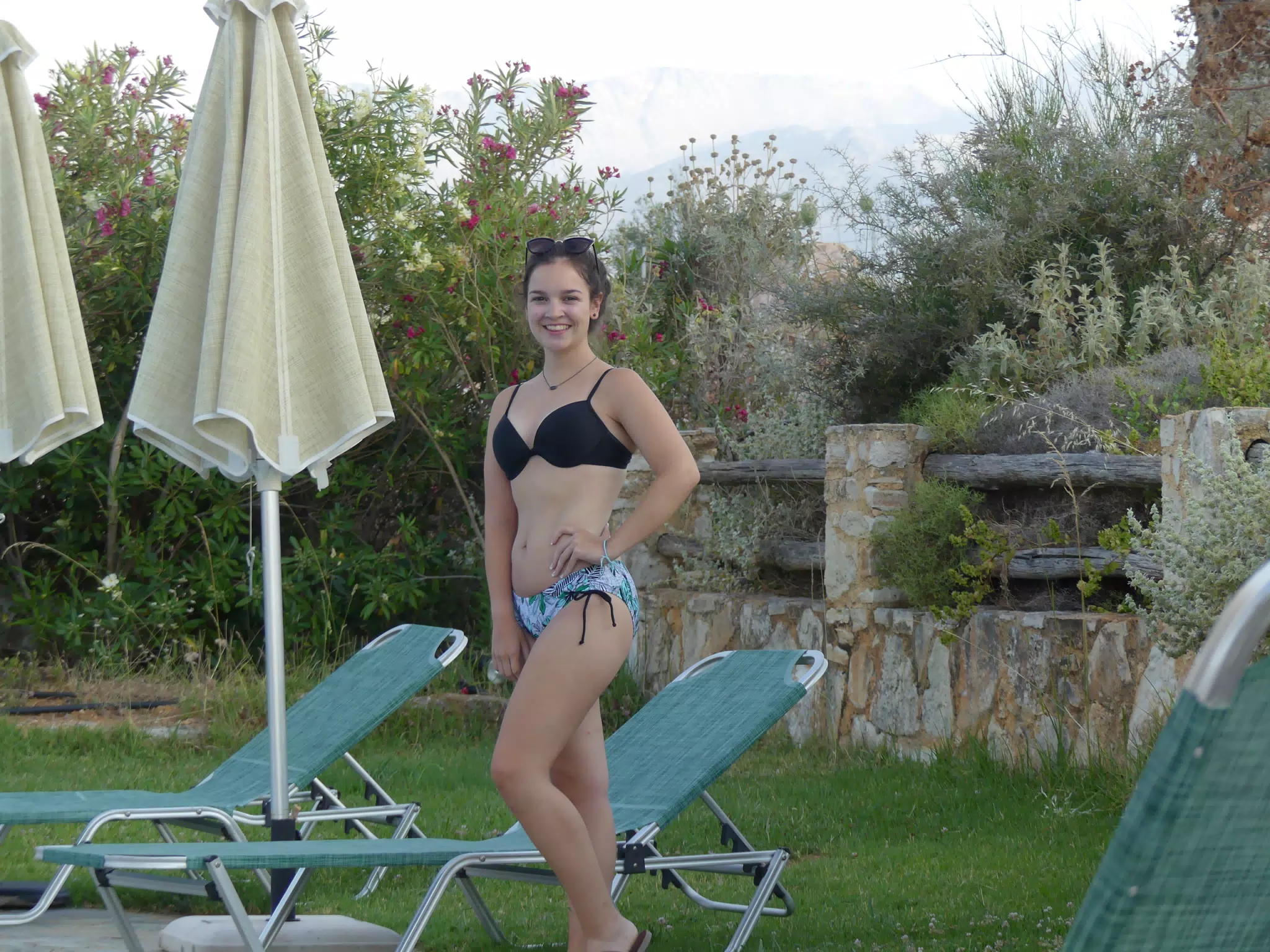 Girl in Swimsuit by Swimming Pool in Aptera, Crete