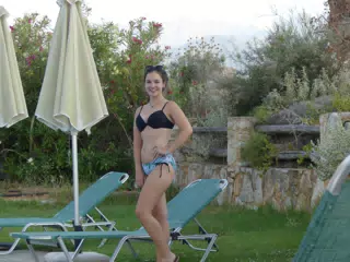 Girl in Swimsuit by Swimming Pool in Aptera, Crete