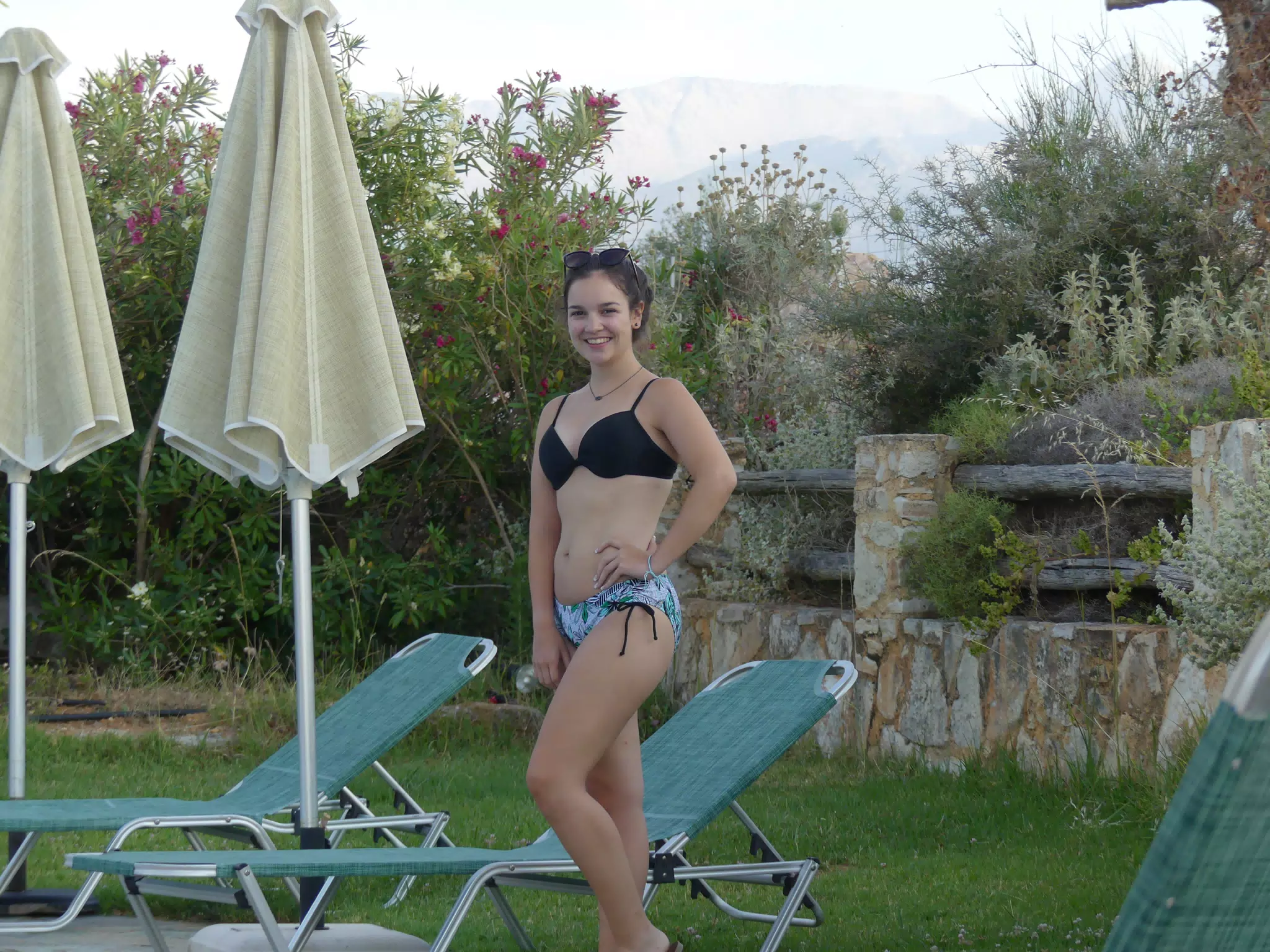 Emily Modeling at the Side of Pool in Aptera