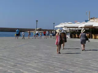 The Girls Walking in the Venetian Harbor at Chania