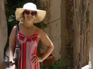 Emily in Hat and Dress in Chania Street