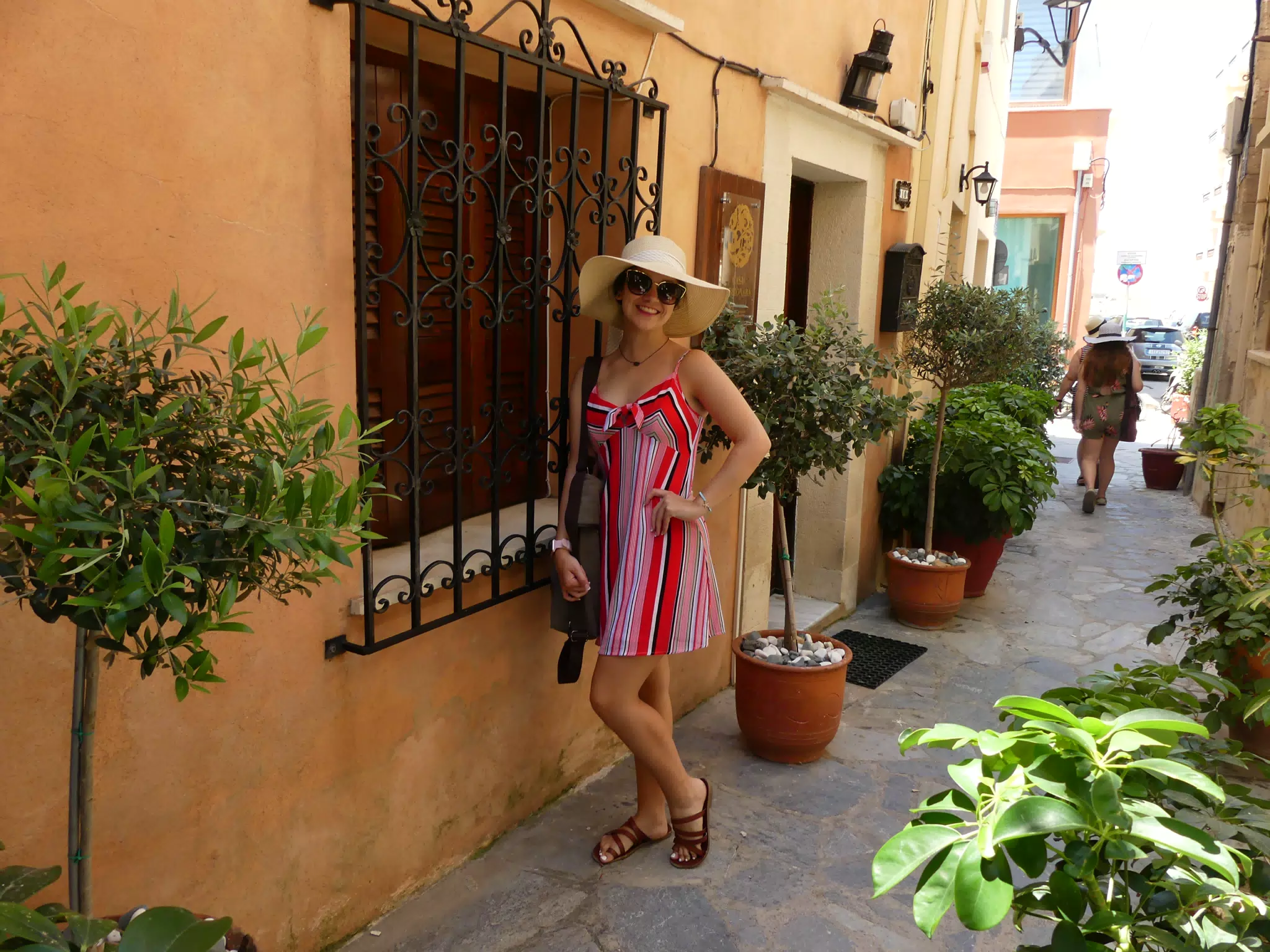 Emily Posing in Striped Dress in Chania Alley