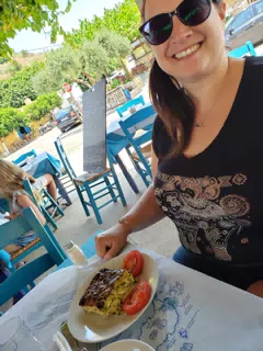 Dominica Eating in Taverna in Aptera, Crete
