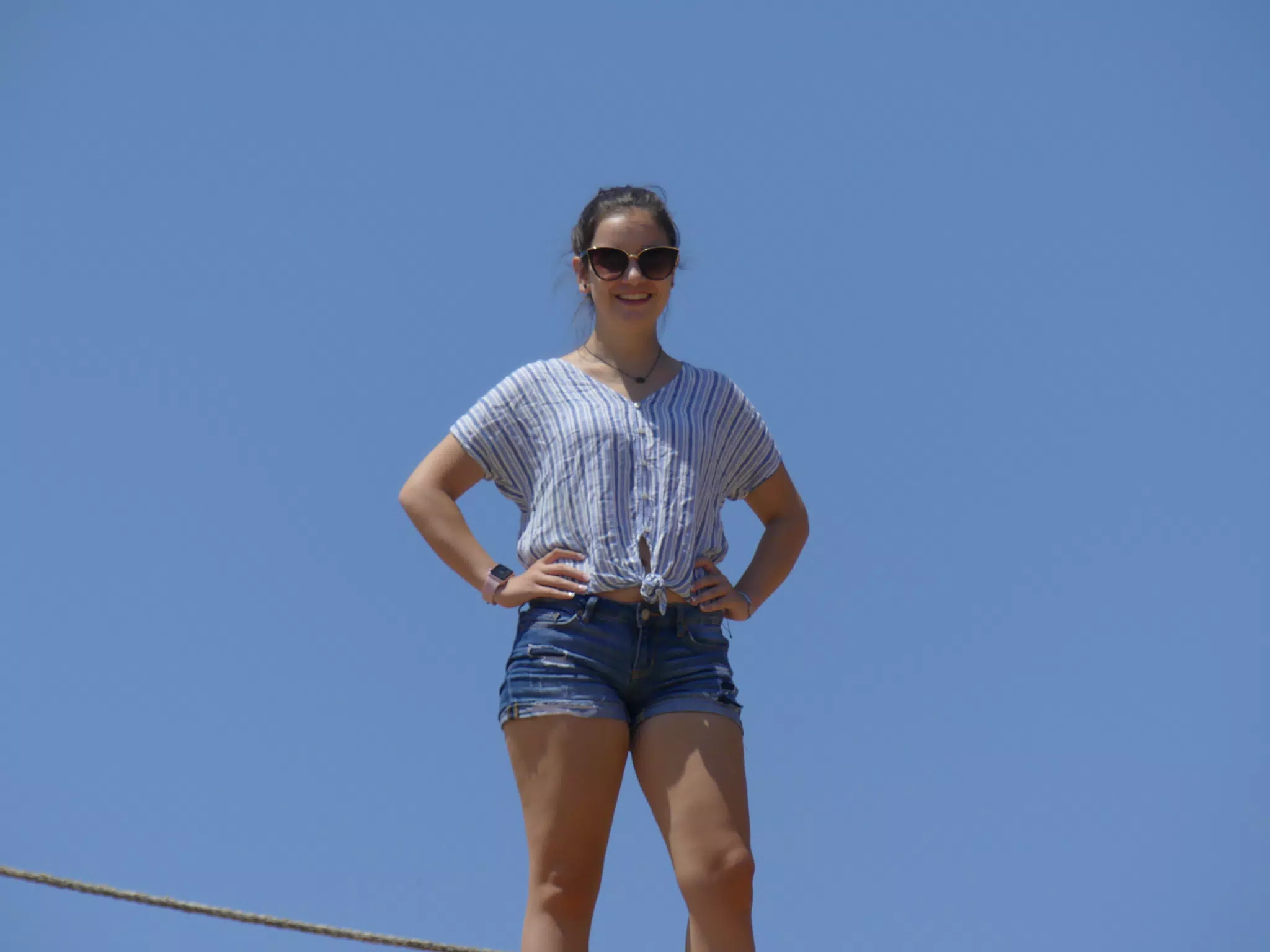 Emily Standing Atop the Amphitheatre in Ancient Aptera