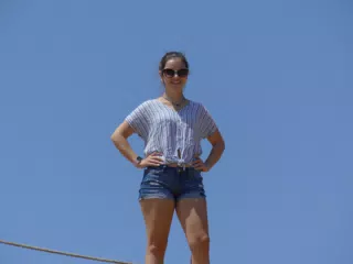 Emily Standing Atop the Amphitheatre in Ancient Aptera