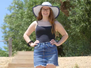 Brunette Posing in Amphitheater in Ancient Aptera