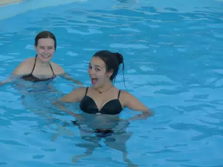 Smiling Girls in Aptera Swimming Pool