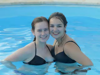Madeline & Emily in Swimming Pool at Aptera Apartment
