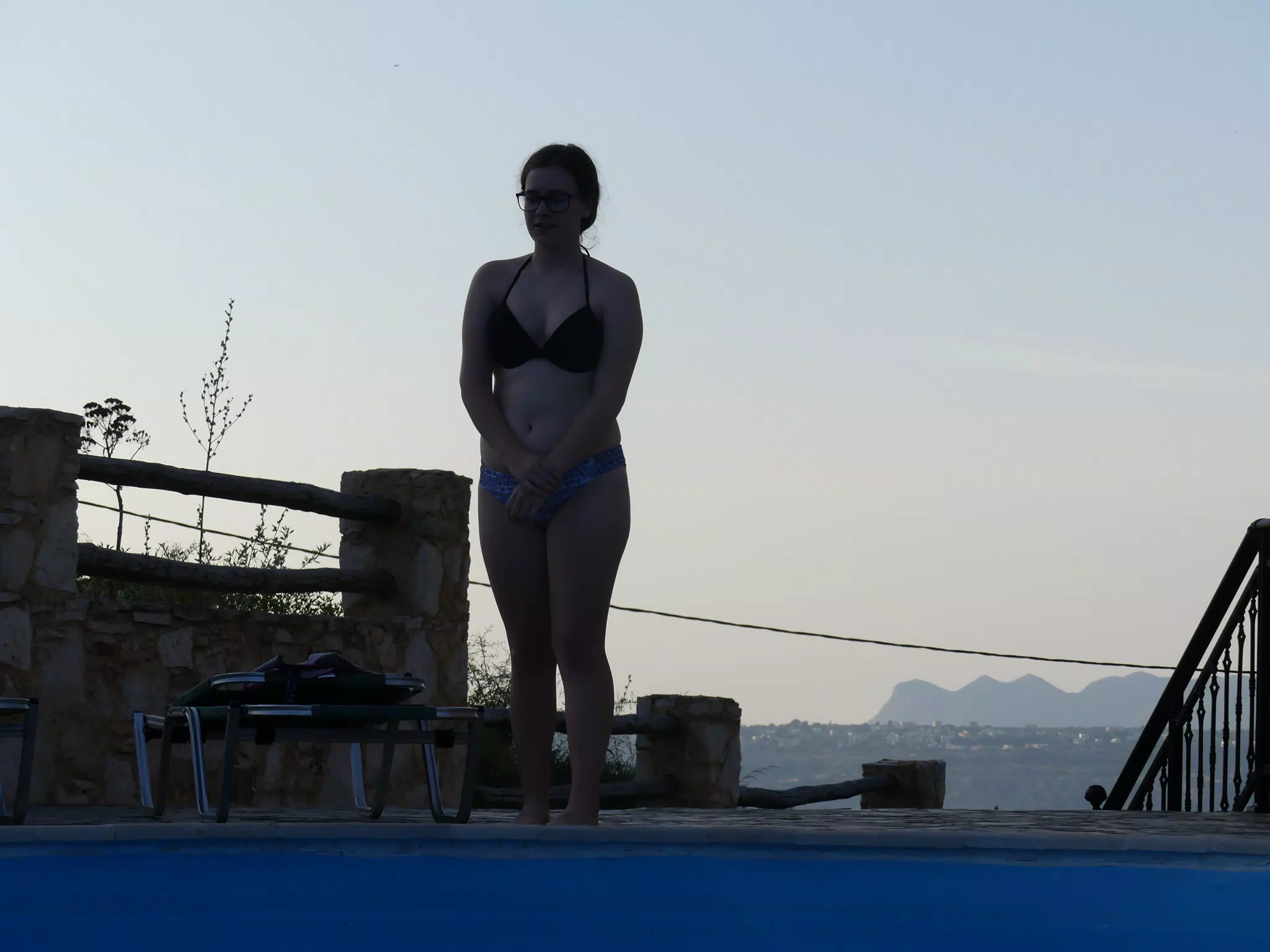 Madeline by Pool at Twilight in Aptera