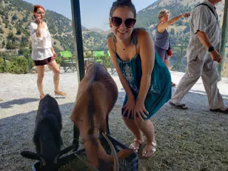 Emily Posing with Goats on Crete