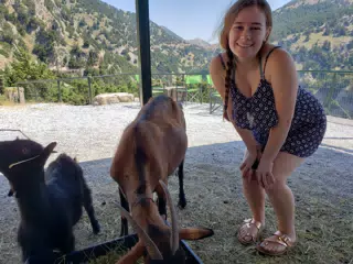 Madeline Posing with Goats on Crete