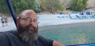 Scott Alan Miller at Glyka Nera Beach