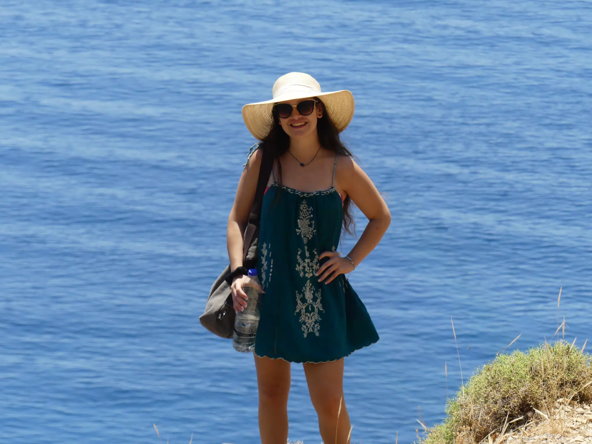 Emily Posing in Hat Along Eastern Glyka Nera Trail