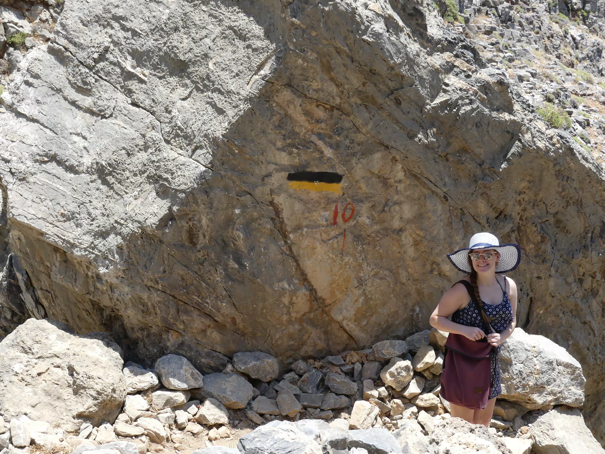 Madeline Standing by Glyka Nera Trail Marker